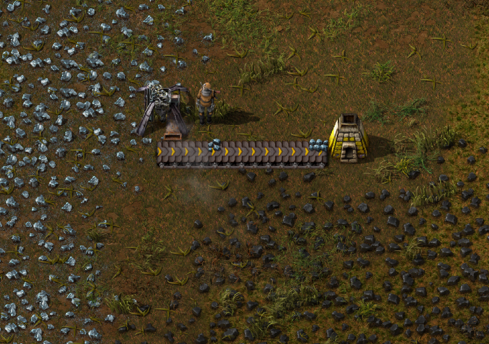 Factorio screenshot of burner drill digging and depositing ore