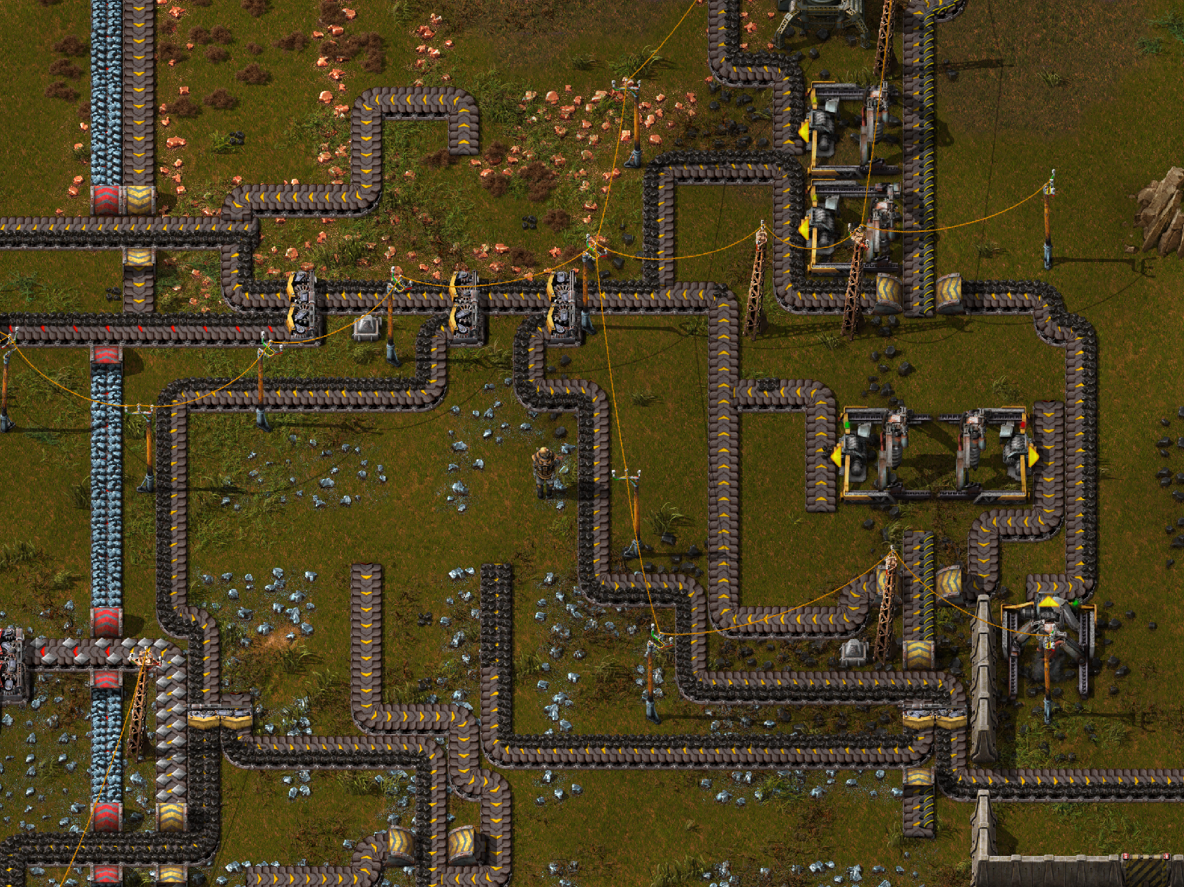 Factorio screenshot of snake-like conveyor belts
