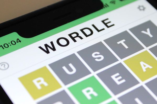 A close-up of the word game Wordle on a smartphone